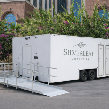 Silverleaf Amenity luxury restroom trailer placed near an upscale outdoor event venue in Colorado