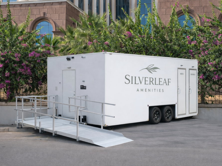 Silverleaf Amenity luxury restroom trailer placed near an upscale outdoor event venue in Colorado