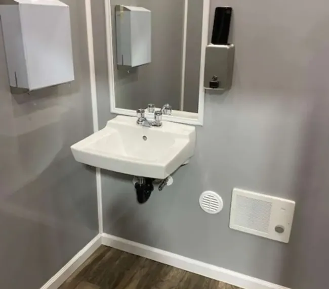 Interior sink and handwashing station inside Silverleaf Amenities luxury ADA restroom trailer