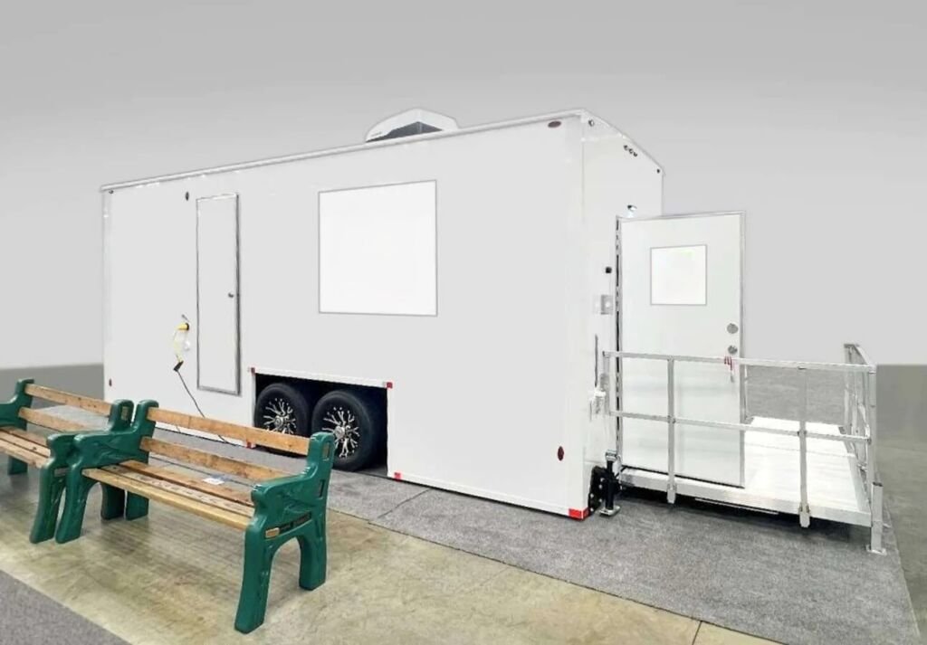ADA-compliant restroom trailer with accessible ramp and exterior setup, ideal for event and construction rentals in Colorado