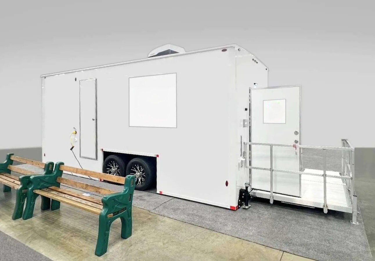 ADA-compliant restroom trailer with accessible ramp and exterior setup, ideal for event and construction rentals in Colorado