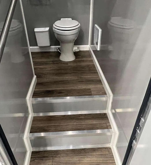 portable-restroom-trailer-interior-steps-toilet-colorado
