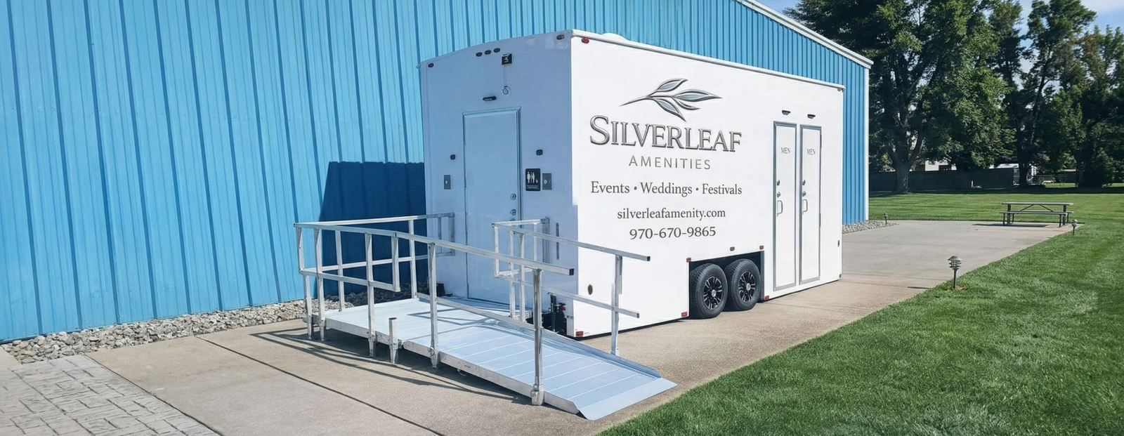 Accessible portable restroom trailer with wheelchair ramp by Silverleaf Amenities for events, weddings, and festivals